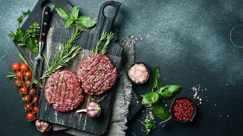 Mediterranean herbs and hamburger patties